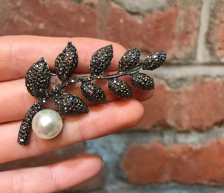 Black leaf brooch