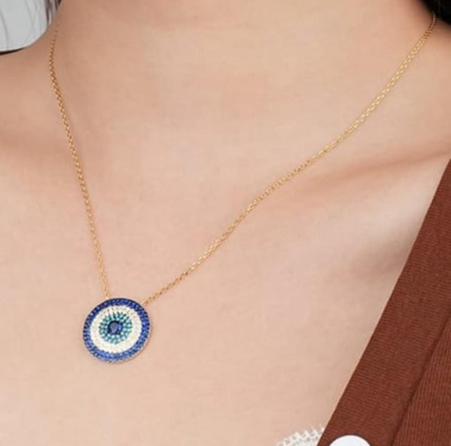 gold evil eye statement necklace