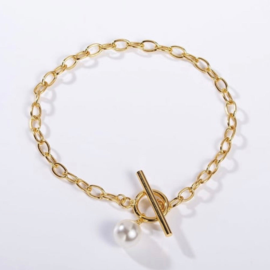 T Bar Gold and Pearl bracelet